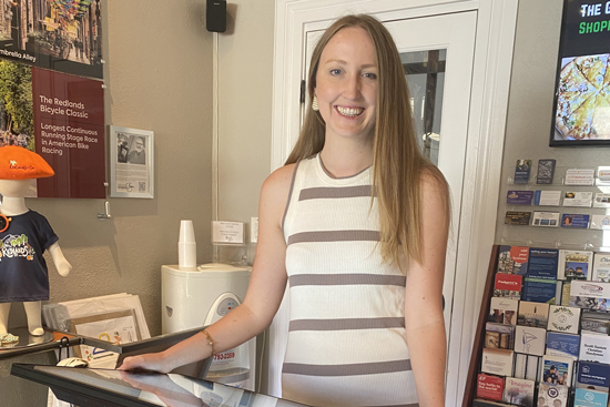 Annie smiling inside the visitor center